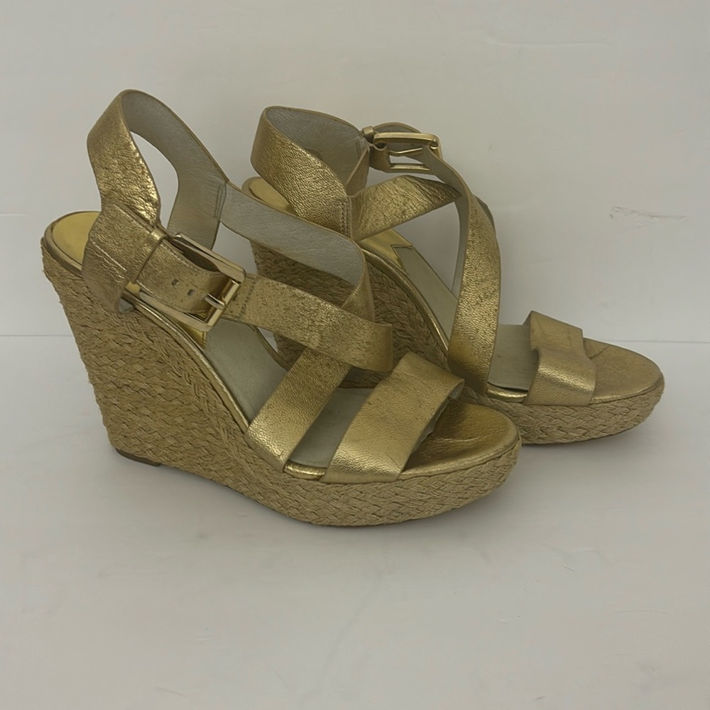 Michael kors shoes. It has a few spots you can see them in the photos. Pre-owned
